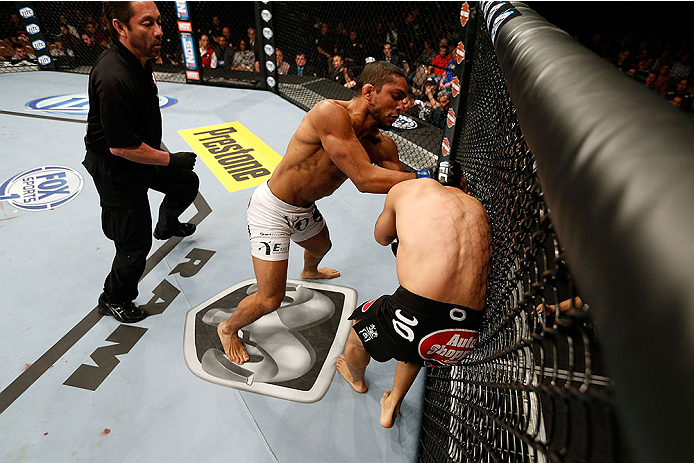 LAS VEGAS, NV - NOVEMBER 30: (L-R) Maximo Blanco attacks Akira Corassani in their featherweight fight during The Ultimate Fighter season 18 live finale inside the Mandalay Bay Events Center on November 30, 2013 in Las Vegas, Nevada. (Photo by Josh Hedges