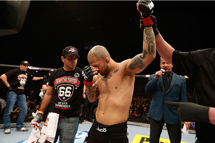 LAS VEGAS, NV - NOVEMBER 30: Akira Corassani is announced the winner over Maximo Blanco by stoppage due to an illegal knee to the face of Corassani by Blanco in their featherweight fight during The Ultimate Fighter season 18 live finale inside the Mandal