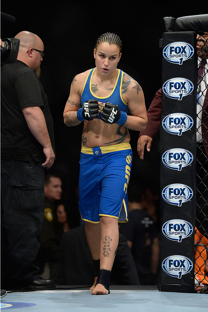 LAS VEGAS, NV - NOVEMBER 30:  Raquel Pennington enters the Octagon before her fight against Roxanne Modafferi in their women's bantamweight fight during The Ultimate Fighter season 18 live finale inside the Mandalay Bay Events Center on November 30, 2013 