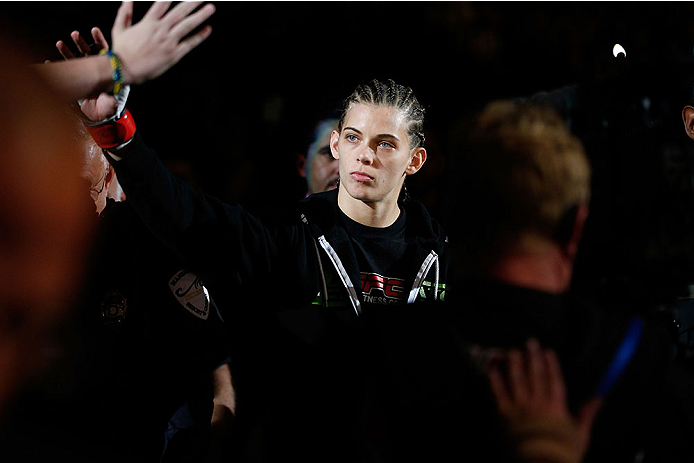 LAS VEGAS, NV - NOVEMBER 30: Jessamyn Duke enters the arena before her fight against Peggy Morgan in their women's bantamweight fight during The Ultimate Fighter season 18 live finale inside the Mandalay Bay Events Center on November 30, 2013 in Las Vega