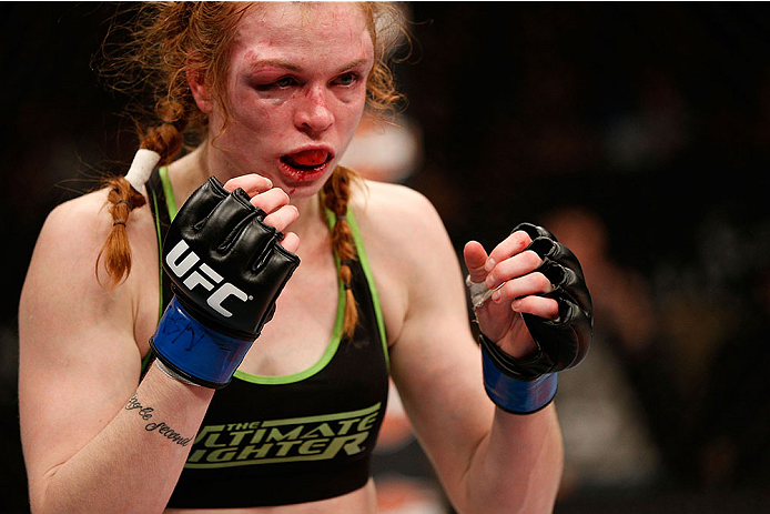 LAS VEGAS, NV - NOVEMBER 30:  Peggy Morgan looks to strike Jessamyn Duke in their women's bantamweight fight during The Ultimate Fighter season 18 live finale inside the Mandalay Bay Events Center on November 30, 2013 in Las Vegas, Nevada. (Photo by Josh 