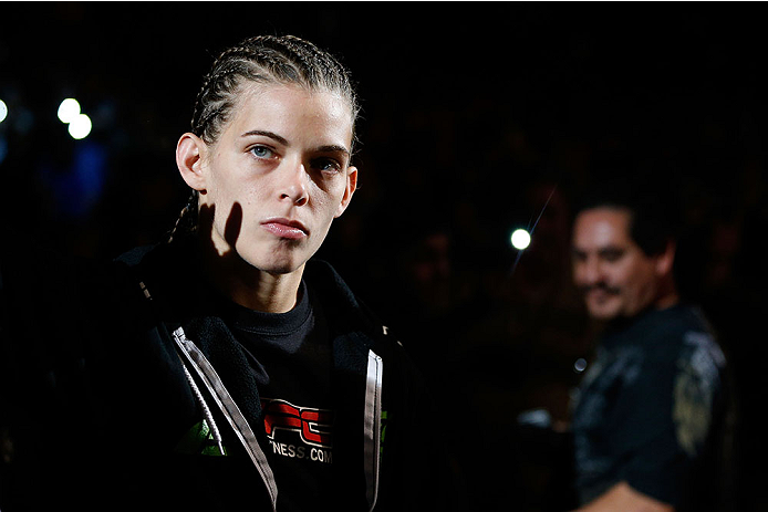 LAS VEGAS, NV - NOVEMBER 30:  Jessamyn Duke enters the arena before her fight against Peggy Morgan in their women's bantamweight fight during The Ultimate Fighter season 18 live finale inside the Mandalay Bay Events Center on November 30, 2013 in Las Vega