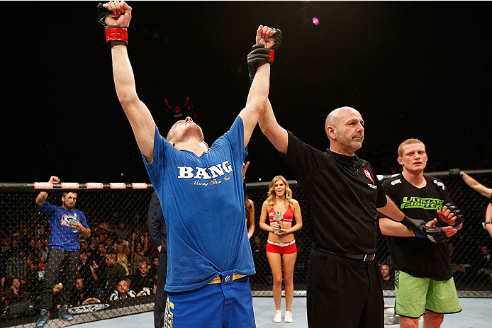 LAS VEGAS, NV - NOVEMBER 30: Chris Holdsworth (L) celebrates after defeating David Grant in their bantamweight final fight during The Ultimate Fighter season 18 live finale inside the Mandalay Bay Events Center on November 30, 2013 in Las Vegas, Nevada.