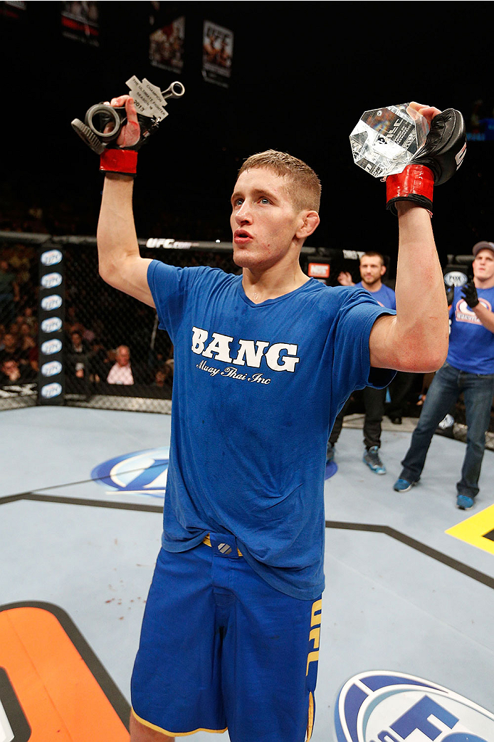 LAS VEGAS, NV - NOVEMBER 30:  Chris Holdsworth celebrates after defeating David Grant in their bantamweight final fight during The Ultimate Fighter season 18 live finale inside the Mandalay Bay Events Center on November 30, 2013 in Las Vegas, Nevada. (Pho