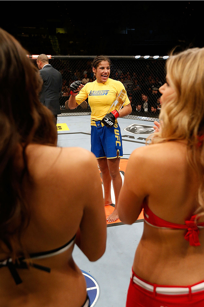 LAS VEGAS, NV - NOVEMBER 30:  Julianna Pena celebrates after defeating Jessica Rakoczy in their women's bantamweight final fight during The Ultimate Fighter season 18 live finale inside the Mandalay Bay Events Center on November 30, 2013 in Las Vegas, Nev