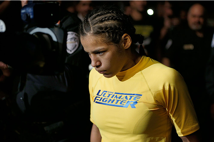 LAS VEGAS, NV - NOVEMBER 30:  Julianna Pena enters the arena before facing Jessica Rakoczy in their women's bantamweight final fight during The Ultimate Fighter season 18 live finale inside the Mandalay Bay Events Center on November 30, 2013 in Las Vegas,