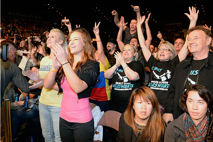 LAS VEGAS, NV - NOVEMBER 30:  UFC women's bantamweight fighter Miesha Tate cheers on Julianna Pena during her women's bantamweight final fight against Jessica Rakoczy during The Ultimate Fighter season 18 live finale inside the Mandalay Bay Events Center 