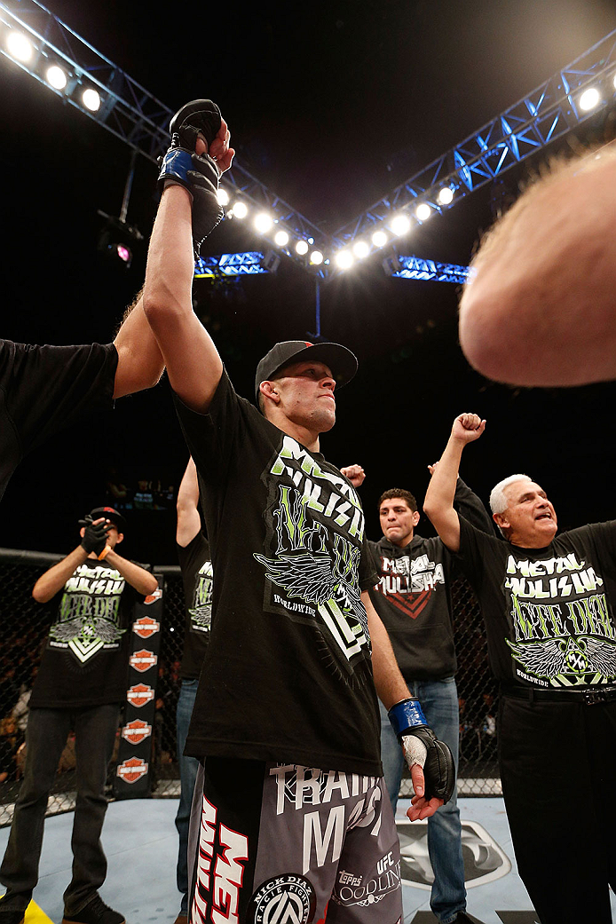 LAS VEGAS, NV - NOVEMBER 30: Nate Diaz celebrates after knocking out Gray Maynard in their lightweight fight during The Ultimate Fighter season 18 live finale inside the Mandalay Bay Events Center on November 30, 2013 in Las Vegas, Nevada. (Photo by Josh