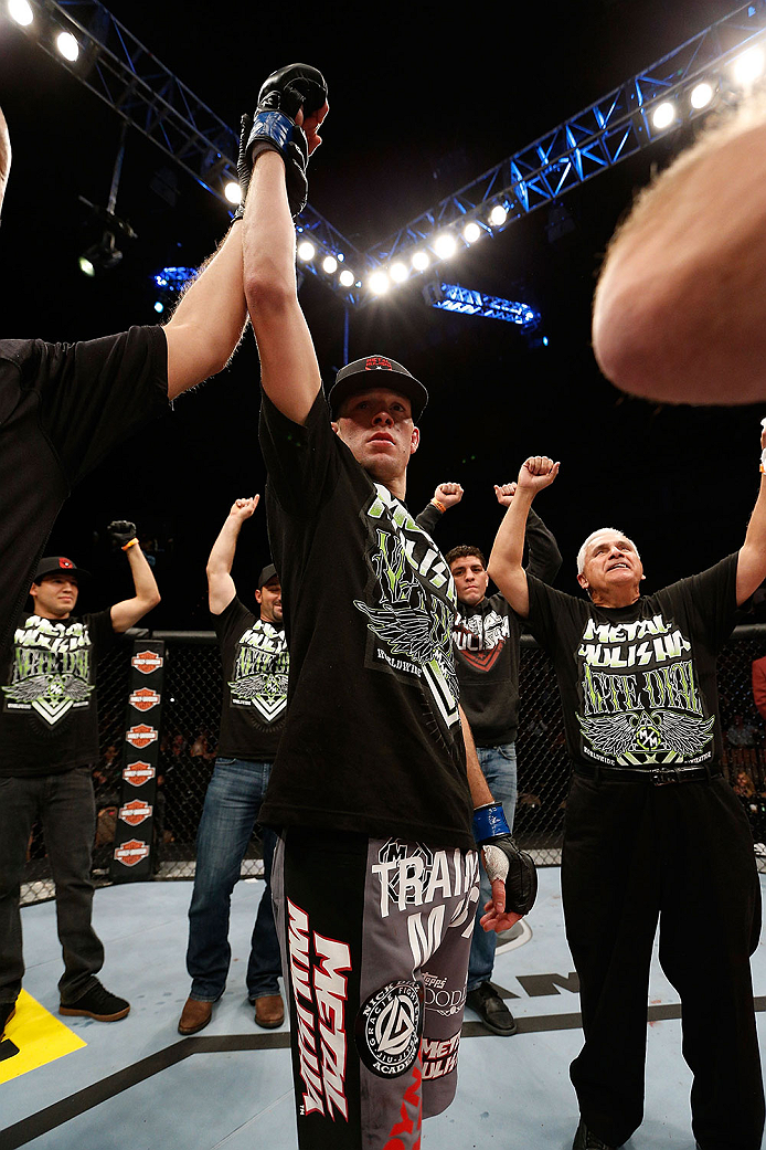 LAS VEGAS, NV - NOVEMBER 30: Nate Diaz celebrates after knocking out Gray Maynard in their lightweight fight during The Ultimate Fighter season 18 live finale inside the Mandalay Bay Events Center on November 30, 2013 in Las Vegas, Nevada. (Photo by Josh