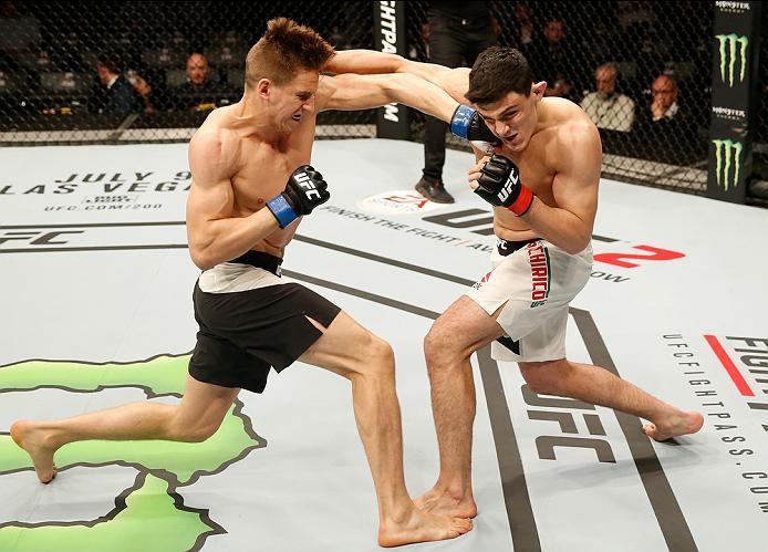 ZAGREB, CROATIA - APRIL 10:   (R-L) Alessio Di Chirico exchanges punches with Bojan Velickovic in their middleweight bout during the UFC Fight Night event at the Arena Zagreb on April 10, 2016 in Zagreb, Croatia. (Photo by Srdjan Stevanovic/Zuffa LLC/Zuff
