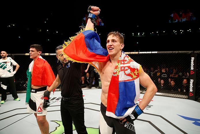 ZAGREB, CROATIA - APRIL 10:   (R-L) Bojan Velickovic celebrates his submission victory over Alessio Di Chirico  in their middleweight bout during the UFC Fight Night event at the Arena Zagreb on April 10, 2016 in Zagreb, Croatia. (Photo by Srdjan Stevanov