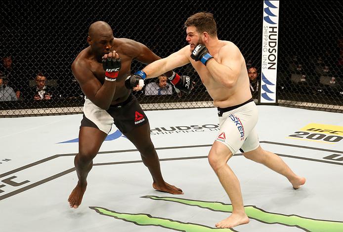 ZAGREB, CROATIA - APRIL 10:   (R-L) Cyril Asker punches Jared Cannonier in their heavyweight bout during the UFC Fight Night event at the Arena Zagreb on April 10, 2016 in Zagreb, Croatia. (Photo by Srdjan Stevanovic/Zuffa LLC/Zuffa LLC via Getty Images)