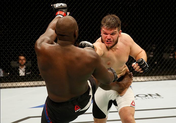 ZAGREB, CROATIA - APRIL 10:   (R-L) Cyril Asker punches Jared Cannonier in their heavyweight bout during the UFC Fight Night event at the Arena Zagreb on April 10, 2016 in Zagreb, Croatia. (Photo by Srdjan Stevanovic/Zuffa LLC/Zuffa LLC via Getty Images)