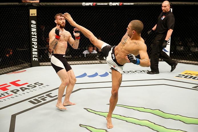 ZAGREB, CROATIA - APRIL 10:   (R-L) Lucas Martins kicks Rob Whiteford in their featherweight bout during the UFC Fight Night event at the Arena Zagreb on April 10, 2016 in Zagreb, Croatia. (Photo by Srdjan Stevanovic/Zuffa LLC/Zuffa LLC via Getty Images)