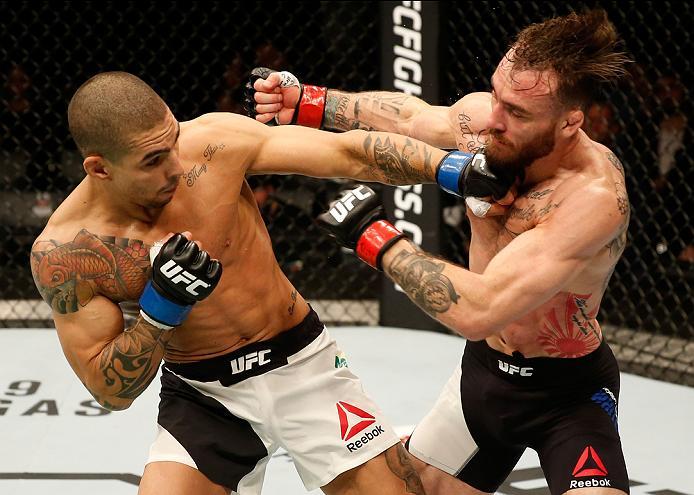 ZAGREB, CROATIA - APRIL 10:   (L-R) Lucas Martins punches Rob Whiteford in their featherweight bout during the UFC Fight Night event at the Arena Zagreb on April 10, 2016 in Zagreb, Croatia. (Photo by Srdjan Stevanovic/Zuffa LLC/Zuffa LLC via Getty Images