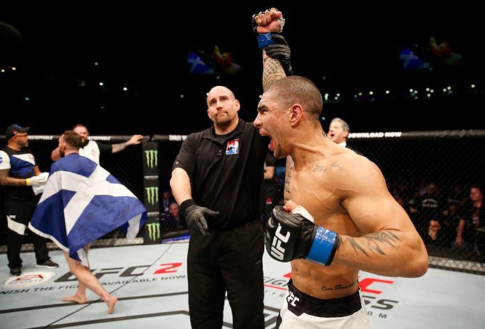 ZAGREB, CROATIA - APRIL 10:   (R-L) Lucas Martinscelebrates his victory over Rob Whiteford in their featherweight bout during the UFC Fight Night event at the Arena Zagreb on April 10, 2016 in Zagreb, Croatia. (Photo by Srdjan Stevanovic/Zuffa LLC/Zuffa L