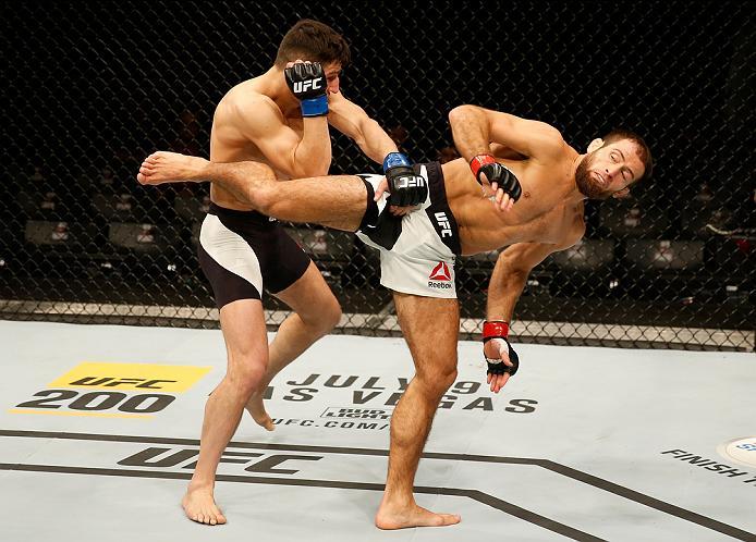 ZAGREB, CROATIA - APRIL 10:   (R-L) Mairbek Taisumov kicks Damir Hadzovic in their lightweight bout during the UFC Fight Night event at the Arena Zagreb on April 10, 2016 in Zagreb, Croatia. (Photo by Srdjan Stevanovic/Zuffa LLC/Zuffa LLC via Getty Images
