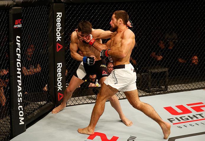 ZAGREB, CROATIA - APRIL 10:   (R-L) Mairbek Taisumov punches Damir Hadzovic in their lightweight bout during the UFC Fight Night event at the Arena Zagreb on April 10, 2016 in Zagreb, Croatia. (Photo by Srdjan Stevanovic/Zuffa LLC/Zuffa LLC via Getty Imag