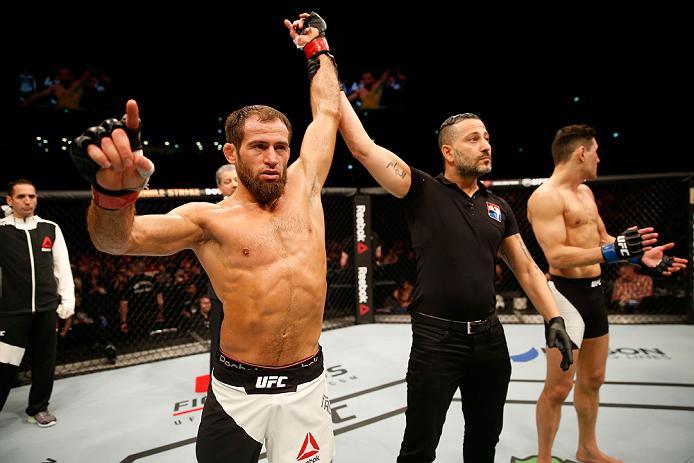 ZAGREB, CROATIA - APRIL 10:   (L-R) Mairbek Taisumov celebrates his knockout victory over Damir Hadzovic in their lightweight bout during the UFC Fight Night event at the Arena Zagreb on April 10, 2016 in Zagreb, Croatia. (Photo by Srdjan Stevanovic/Zuffa