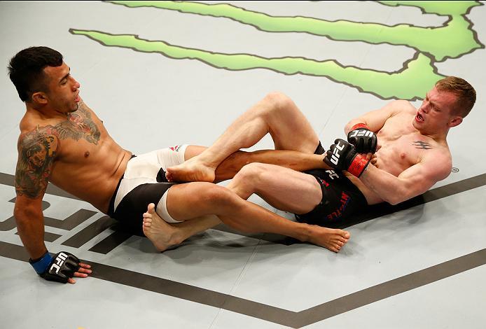 ZAGREB, CROATIA - APRIL 10:   (R-L) Ian Entwistle attempts to submit Alejandro Perez in their bantamweight bout during the UFC Fight Night event at the Arena Zagreb on April 10, 2016 in Zagreb, Croatia. (Photo by Srdjan Stevanovic/Zuffa LLC/Zuffa LLC via 
