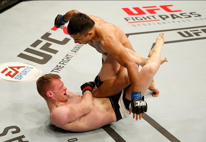 ZAGREB, CROATIA - APRIL 10:   Alejandro Perez (top) punches Ian Entwistle in their bantamweight bout during the UFC Fight Night event at the Arena Zagreb on April 10, 2016 in Zagreb, Croatia. (Photo by Srdjan Stevanovic/Zuffa LLC/Zuffa LLC via Getty Image