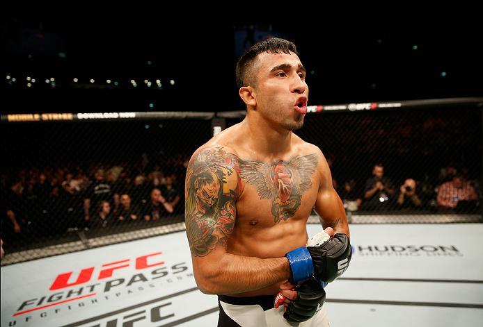 ZAGREB, CROATIA - APRIL 10:   Alejandro Perez celebrates his victory over Ian Entwistle in their bantamweight bout during the UFC Fight Night event at the Arena Zagreb on April 10, 2016 in Zagreb, Croatia. (Photo by Srdjan Stevanovic/Zuffa LLC/Zuffa LLC v