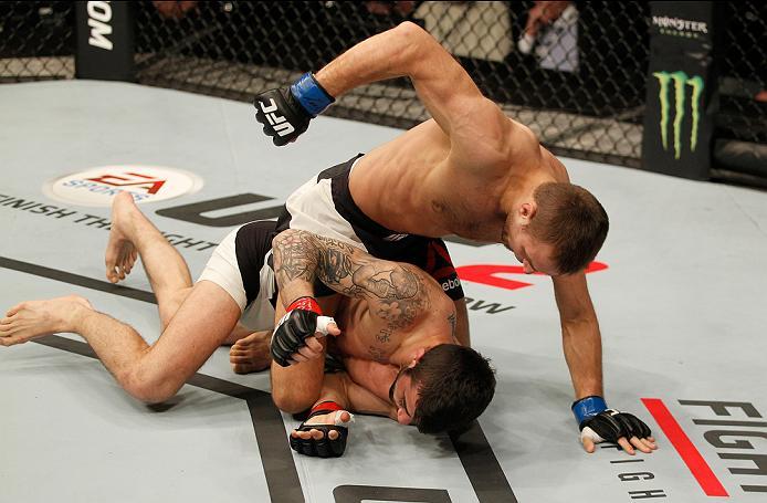 ZAGREB, CROATIA - APRIL 10:   Damian Stasiakin (top) punches Filip Pejic in their bantamweight bout during the UFC Fight Night event at the Arena Zagreb on April 10, 2016 in Zagreb, Croatia. (Photo by Srdjan Stevanovic/Zuffa LLC/Zuffa LLC via Getty Images