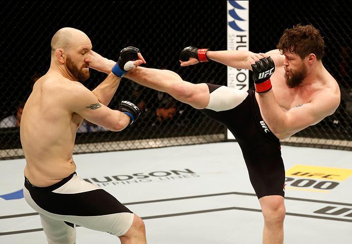 ZAGREB, CROATIA - APRIL 10:   (R-L) Nicolas Dalby kicks Zak Cummings in their welterweight bout during the UFC Fight Night event at the Arena Zagreb on April 10, 2016 in Zagreb, Croatia. (Photo by Srdjan Stevanovic/Zuffa LLC/Zuffa LLC via Getty Images)