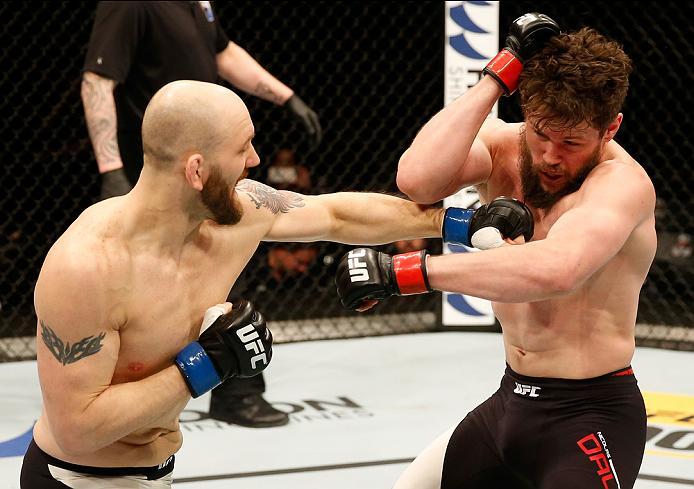 ZAGREB, CROATIA - APRIL 10:   (L-R) Zak Cummings punches Nicolas Dalby in their welterweight bout during the UFC Fight Night event at the Arena Zagreb on April 10, 2016 in Zagreb, Croatia. (Photo by Srdjan Stevanovic/Zuffa LLC/Zuffa LLC via Getty Images)