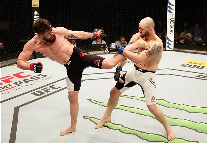 ZAGREB, CROATIA - APRIL 10:   (L-R) Nicolas Dalby kicks Zak Cummings in their welterweight bout during the UFC Fight Night event at the Arena Zagreb on April 10, 2016 in Zagreb, Croatia. (Photo by Srdjan Stevanovic/Zuffa LLC/Zuffa LLC via Getty Images)