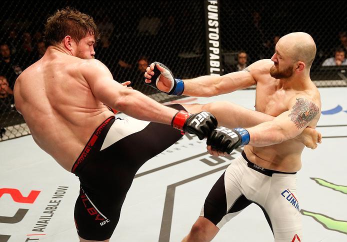 ZAGREB, CROATIA - APRIL 10:   (L-R) Nicolas Dalby kicks Zak Cummings in their welterweight bout during the UFC Fight Night event at the Arena Zagreb on April 10, 2016 in Zagreb, Croatia. (Photo by Srdjan Stevanovic/Zuffa LLC/Zuffa LLC via Getty Images)