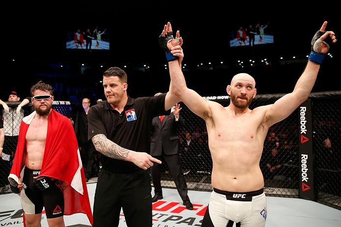 ZAGREB, CROATIA - APRIL 10:   (R-L) Zak Cummings celebrates his victory over Nicolas Dalby in their welterweight bout during the UFC Fight Night event at the Arena Zagreb on April 10, 2016 in Zagreb, Croatia. (Photo by Srdjan Stevanovic/Zuffa LLC/Zuffa LL