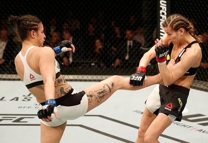 ZAGREB, CROATIA - APRIL 10:   (L-R) Cristina Stanciu kicks Maryna Moroz in their strawweight bout during the UFC Fight Night event at the Arena Zagreb on April 10, 2016 in Zagreb, Croatia. (Photo by Srdjan Stevanovic/Zuffa LLC/Zuffa LLC via Getty Images)