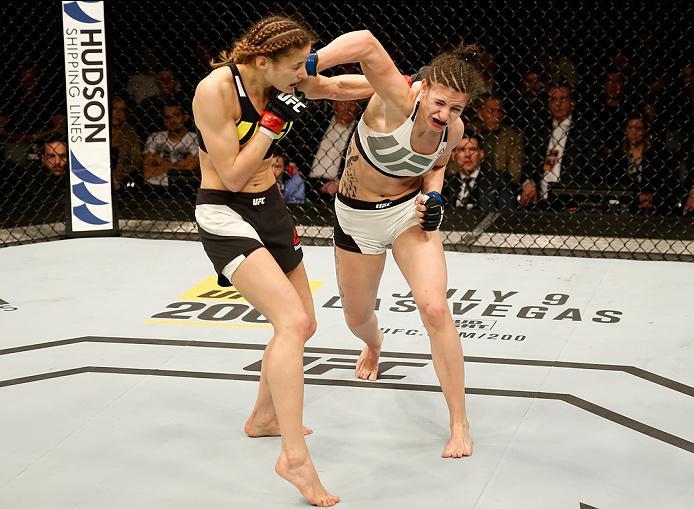 ZAGREB, CROATIA - APRIL 10:   (R-L) Cristina Stanciu punches Maryna Moroz in their strawweight bout during the UFC Fight Night event at the Arena Zagreb on April 10, 2016 in Zagreb, Croatia. (Photo by Srdjan Stevanovic/Zuffa LLC/Zuffa LLC via Getty Images