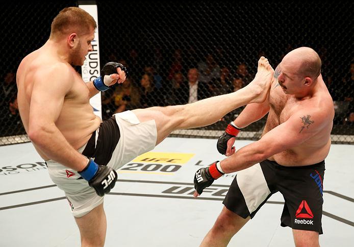 ZAGREB, CROATIA - APRIL 10:   (L-R) Marcin Tybura kicks Timothy Johnson in their heavyweight bout during the UFC Fight Night event at the Arena Zagreb on April 10, 2016 in Zagreb, Croatia. (Photo by Srdjan Stevanovic/Zuffa LLC/Zuffa LLC via Getty Images)