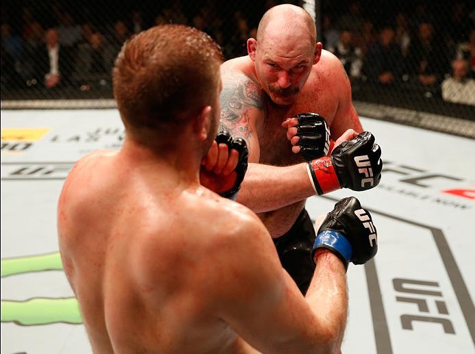 ZAGREB, CROATIA - APRIL 10:   (L-R) Marcin Tybura punches Timothy Johnson in their heavyweight bout during the UFC Fight Night event at the Arena Zagreb on April 10, 2016 in Zagreb, Croatia. (Photo by Srdjan Stevanovic/Zuffa LLC/Zuffa LLC via Getty Images