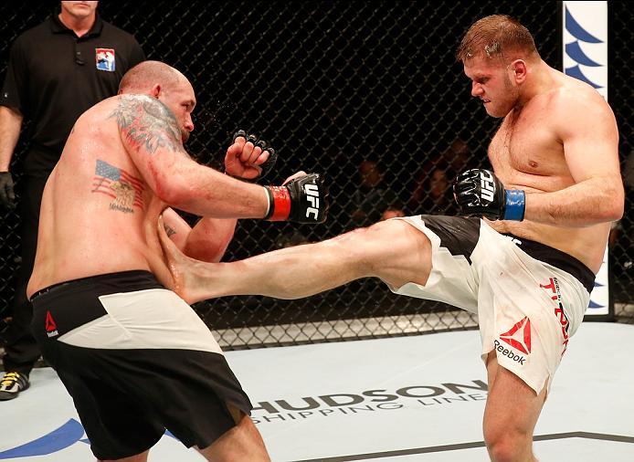 ZAGREB, CROATIA - APRIL 10:   (R-L) Marcin Tybura kicks Timothy Johnson in their heavyweight bout during the UFC Fight Night event at the Arena Zagreb on April 10, 2016 in Zagreb, Croatia. (Photo by Srdjan Stevanovic/Zuffa LLC/Zuffa LLC via Getty Images)