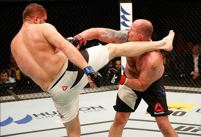 ZAGREB, CROATIA - APRIL 10:   (L-R) Marcin Tybura kicks Timothy Johnson in their heavyweight bout during the UFC Fight Night event at the Arena Zagreb on April 10, 2016 in Zagreb, Croatia. (Photo by Srdjan Stevanovic/Zuffa LLC/Zuffa LLC via Getty Images)