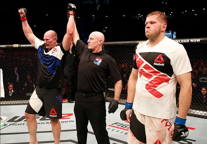ZAGREB, CROATIA - APRIL 10:   (L-R) Timothy Johnson celebrates his victory over Marcin Tybura in their heavyweight bout during the UFC Fight Night event at the Arena Zagreb on April 10, 2016 in Zagreb, Croatia. (Photo by Srdjan Stevanovic/Zuffa LLC/Zuffa 