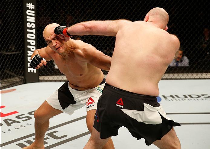ZAGREB, CROATIA - APRIL 10:   (R-L) Ben Rothwell punches Junior Dos Santos in their heavyweight bout during the UFC Fight Night event at the Arena Zagreb on April 10, 2016 in Zagreb, Croatia. (Photo by Srdjan Stevanovic/Zuffa LLC/Zuffa LLC via Getty Image