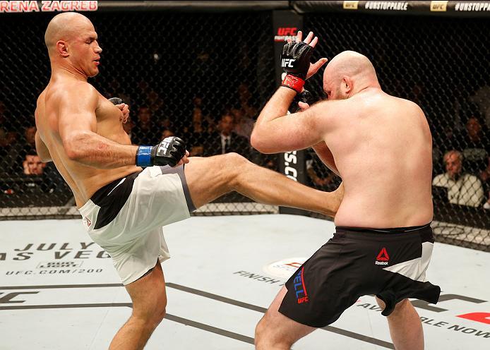 ZAGREB, CROATIA - APRIL 10:   (L-R) Junior Dos Santos kicks Ben Rothwell in their heavyweight bout during the UFC Fight Night event at the Arena Zagreb on April 10, 2016 in Zagreb, Croatia. (Photo by Srdjan Stevanovic/Zuffa LLC/Zuffa LLC via Getty Images)
