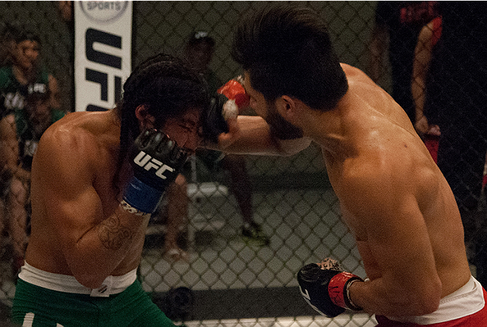 LAS VEGAS, NV - MARCH 27:  (R-L) Horacio Gutierrez punches Danny Salas during the filming of The Ultimate Fighter Latin America: Team Gastelum vs Team Escudero  on March 27, 2015 in Las Vegas, Nevada. (Photo by Brandon Magnus/Zuffa LLC/Zuffa LLC via Getty