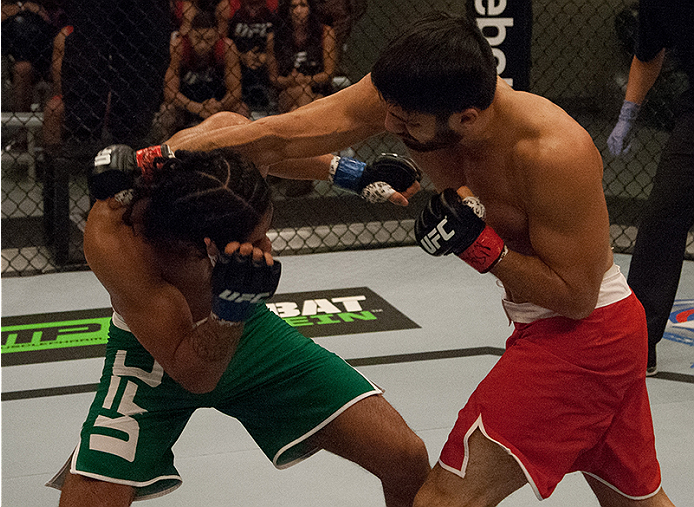 LAS VEGAS, NV - MARCH 27:  (R-L) Horacio Gutierrez punches Danny Salas during the filming of The Ultimate Fighter Latin America: Team Gastelum vs Team Escudero  on March 27, 2015 in Las Vegas, Nevada. (Photo by Brandon Magnus/Zuffa LLC/Zuffa LLC via Getty