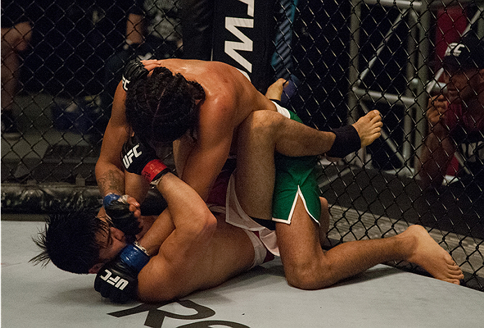 LAS VEGAS, NV - MARCH 27:  Danny Salas (top) punches Horacio Gutierrez during the filming of The Ultimate Fighter Latin America: Team Gastelum vs Team Escudero  on March 27, 2015 in Las Vegas, Nevada. (Photo by Brandon Magnus/Zuffa LLC/Zuffa LLC via Getty