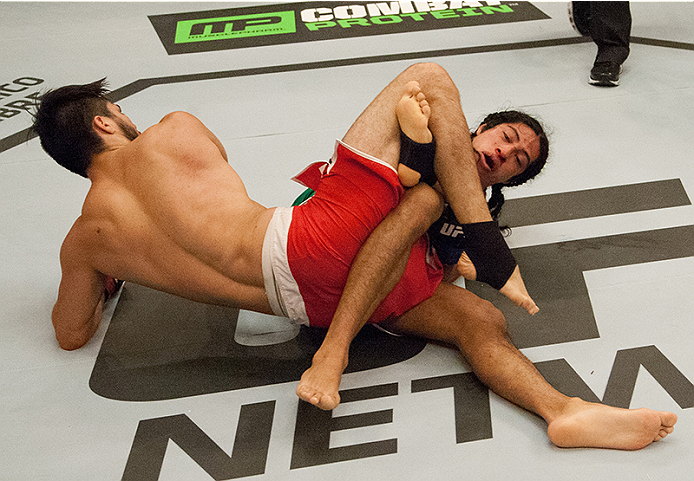 LAS VEGAS, NV - MARCH 27: Danny Salas attempts to submit Horacio Gutierrez during the filming of The Ultimate Fighter Latin America: Team Gastelum vs Team Escudero on March 27, 2015 in Las Vegas, Nevada. (Photo by Brandon Magnus/Zuffa LLC/Zuffa LLC via