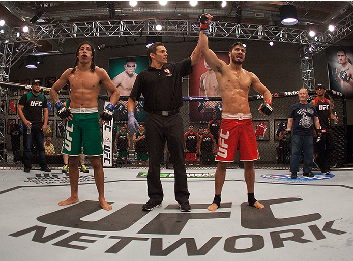 LAS VEGAS, NV - MARCH 27:  (R-L) Horacio Gutierrez celebrates his victory over Danny Salas during the filming of The Ultimate Fighter Latin America: Team Gastelum vs Team Escudero  on March 27, 2015 in Las Vegas, Nevada. (Photo by Brandon Magnus/Zuffa LLC