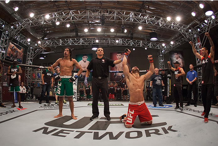LAS VEGAS, NV - MARCH 27: (R-L) Horacio Gutierrez celebrates his victory over Danny Salas during the filming of The Ultimate Fighter Latin America: Team Gastelum vs Team Escudero on March 27, 2015 in Las Vegas, Nevada. (Photo by Brandon Magnus/Zuffa LLC