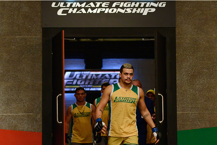 LACHUTE, CANADA - DECEMBER 6:  Team Australia fighter Tyler Manawaroa enters the arena before facing Team Canada fighter Elias Theodorou in their semifinal middleweight fight during filming of The Ultimate Fighter Nations television series on December 6, 