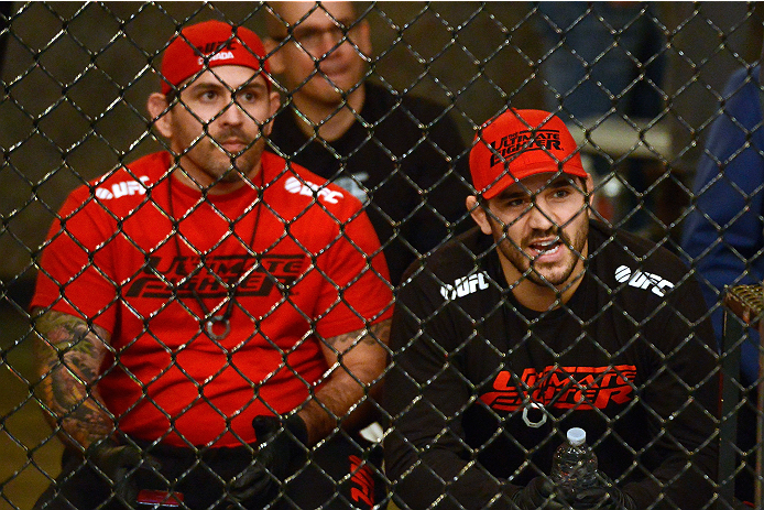 LACHUTE, CANADA - DECEMBER 6:  Team Canada Coach Patrick Cote yells at his fighter Elias Theodorou before he takes on Team Australia fighter Tyler Manawaroa in their semifinal middleweight fight during filming of The Ultimate Fighter Nations television se