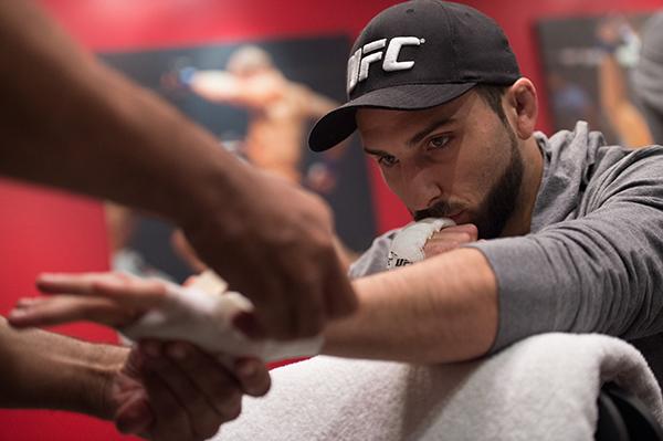 LAS VEGAS, NV - APRIL 21: Enrique Marin gets his hands wrapped before facing Hector Aldana in the semi-finals during the filming of The Ultimate Fighter Latin America: Team Gastelum vs Team Escudero on April 21, 2015 in Las Vegas, Nevada. (Photo by Bran